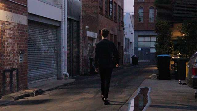 Luke walking down a laneway, sequence